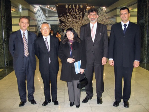 "Croatian delegation headed by Dr. Fuchs, second right, poses with NIMS Vice President Mr. Uehara (second left)." Image