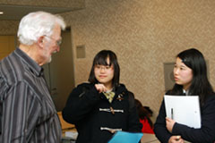 Dr. Rohrer talks with students