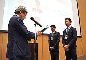 Award of Innovation winners, Prof. Tadahiro Kawasaki (right) and Dr. Yasuhiro Shirai (center)
