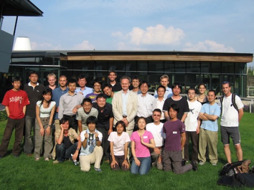 "All the students pose with Prof. Mark Welland, center, in front of the Nanoscience Centre." Image