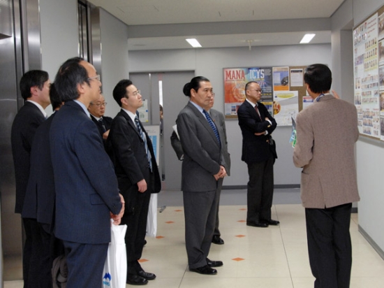 "Photo:  Vice Minister Matsunami listens to explanation of ICYS from Dr. Bando (Managing Director of ICYS)" Image