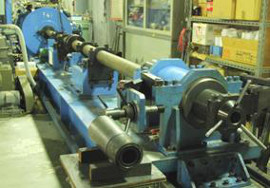 "Figure 2: Single stage propellant gun at National Institute for Materials Science Japan used for the hypervelocity impact experiments." Image
