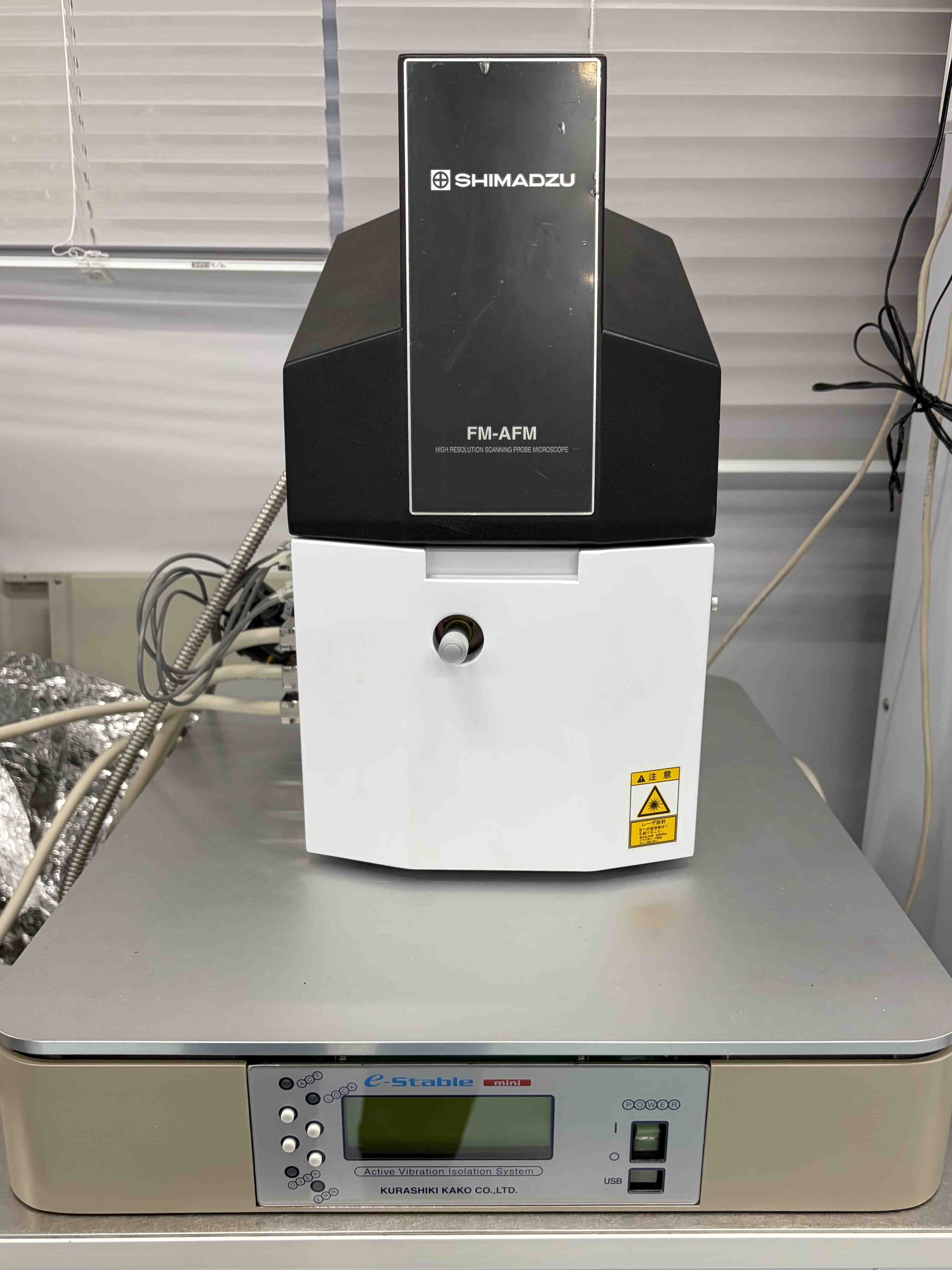 Title:Room temperature beam deflection AFM