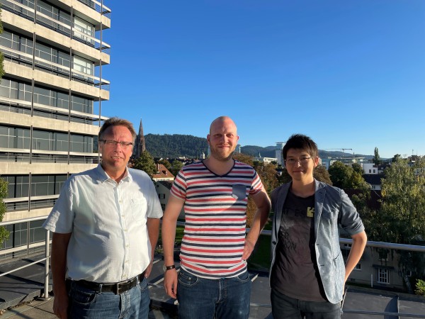 Outdoor snapshot of Mandai, team leader, with Prof. Ingo Krossing and Mr. Hendrik Koger during his research stay at Albert-Ludwigs-Universität Freiburg