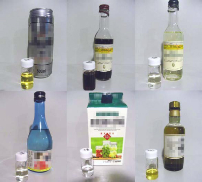 「プレス資料中の図3実験に用いた酒 (ビール、赤ワイン、白ワイン、日本酒、焼酎、ウイスキー) と試料の写真」の画像