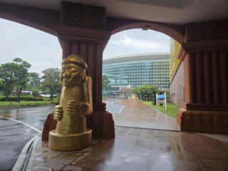 Dol hareubang stone statue at the ICC Jeju entrance